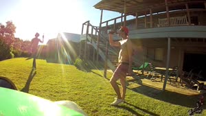 Opening A Beer With A Frisbee