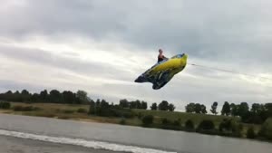 Crazy Guy Flies Behind Speed Boat