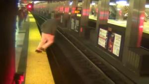 Man Faceplants On Train Tracks