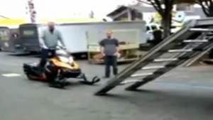 Idiot Loads Snowmobile