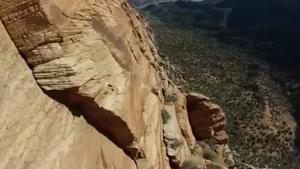 Wingsuit Flyer Nearly Kisses Mountain