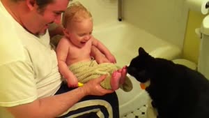 Cat Licking Baby Toes
