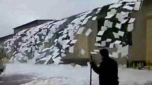 Snow Falls Off Roof In Texas