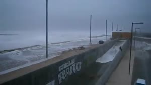 Giant Wave Surprises Man