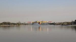 Air Tankers Refilling Water Up Close