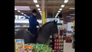 Girl Rides Horse In Supermarket