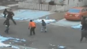 Cool Cop Playing Football With Kids