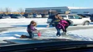 Dad Laughs At Kids Falling On Ice
