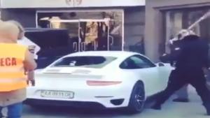 Protesters Destroy Politician's Porsche