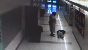 School Principal Dragging Kids Through Hallway