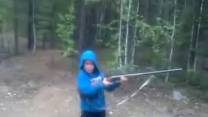 Guy Lets Son Shoot A Rifle