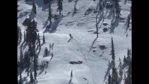 Snow Mobile Up Steep Incline