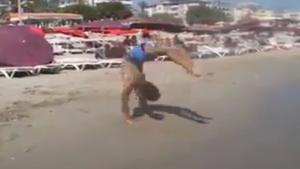 Bizarre Back Flips On The Beach