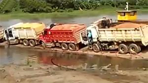 Dump Trucks Slide Of Ferry