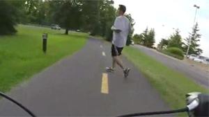 Cyclist Crashes Into Runner