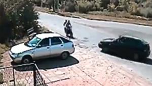 Ignoring Crashed Scooter Driver