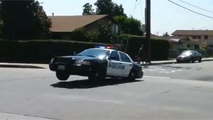 Police Car Goes Airborne