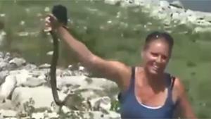 Lady Catching Snakes
