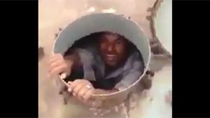 Afghan Guy Rescued From Water Tank