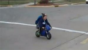 Kid Rides Mini Motorbike To Kindergarten