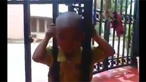 Kid Has Head Stuck In Gate