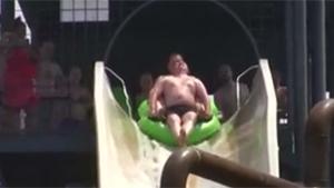 Two Guys Go Airborne On Waterslide