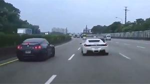 Ferrari 458 Takes Out Nissan GTR