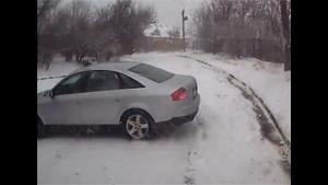 Car Curling On Icy Slope