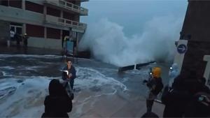Wave Takes Out Weather Forecaster