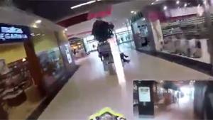 Motorist Racing Through Shopping Mall