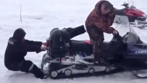 Russian Sucked Into Snow Scooter