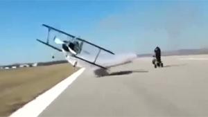 Biplane Makes Insane Low Flyby