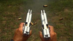 Firing Two Double Barreled Pistols