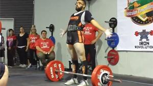 Weightlifter Interacts With His Audience