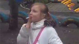Encouraging Young Girl To Smoke