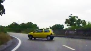 Car Ends Up On The Guard Rail