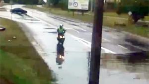 Scooter Vs Flooded Road