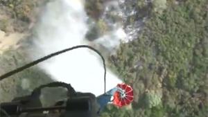 Dropping Water On Forest Fire