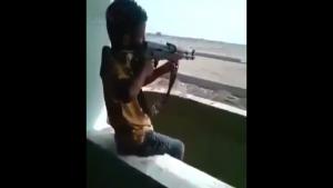 Kid Playing With AK-47