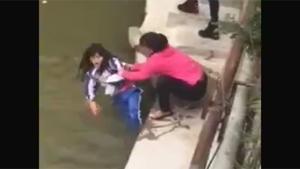 Chinese Mom Threatens To Drown Daughter