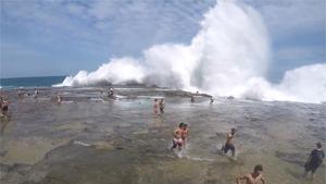 Big Wave Takes Out Everyone