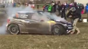 Rally Car Runs Over Photographer