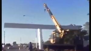 Crane Topples Over