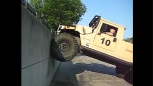 Hummer Driving On Vertical Wall