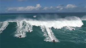 Waterscooters Outrunning Big Wave