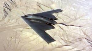 Side By Side With A B2 Stealth Bomber
