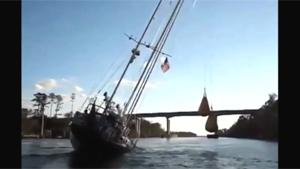 Inventive Sailor Sails Under Low Bridge