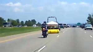 Motorcyclist Goes Head Over Heals