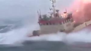 Fishing Trawler Plowing Through Waves