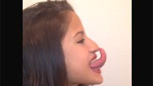 Girl With Huge Tongue